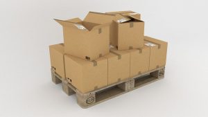 Cardboard boxes on a pallet are a crucial part of corporate packing tips