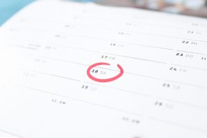 calendar with marked date for organizing a housewarming party