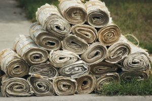 A pile of newspapers on the ground