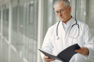 doctor looking at medical records