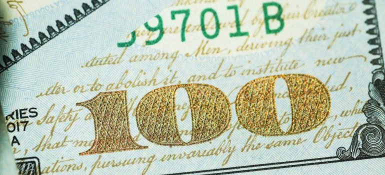 100 dollar bill to illustrate moving estimate