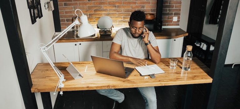 Man working at his desk from home