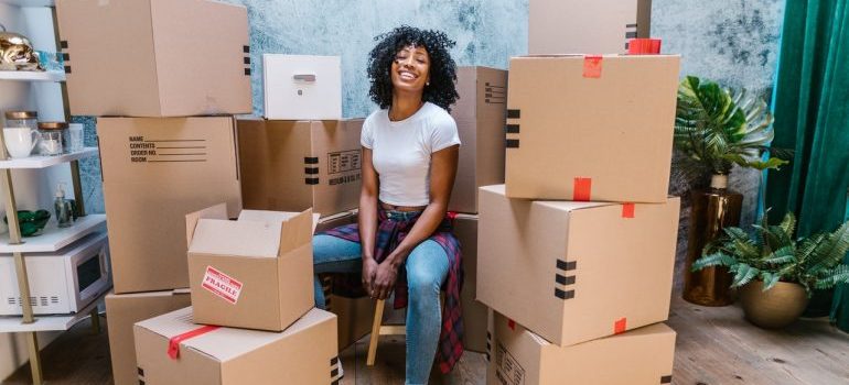 Woman surrounded by boxes