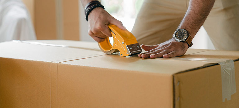 mover packing a box