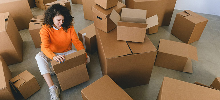 woman using moving supplies long distance moving companies Fort Lauderdale