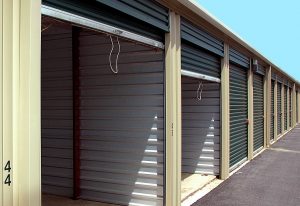 Storage units, some with open and some with closed doors.