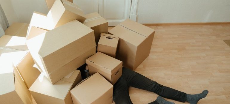 A man under the boxes