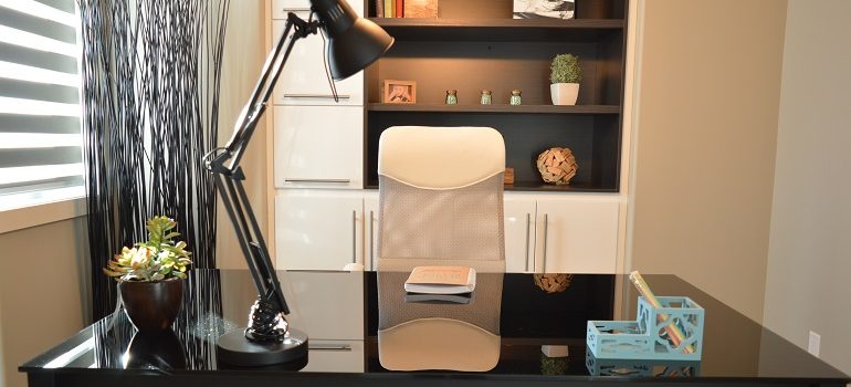 office table with an office chair and lamp