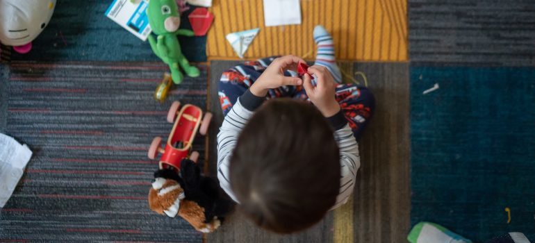 Toddler playing in playroom