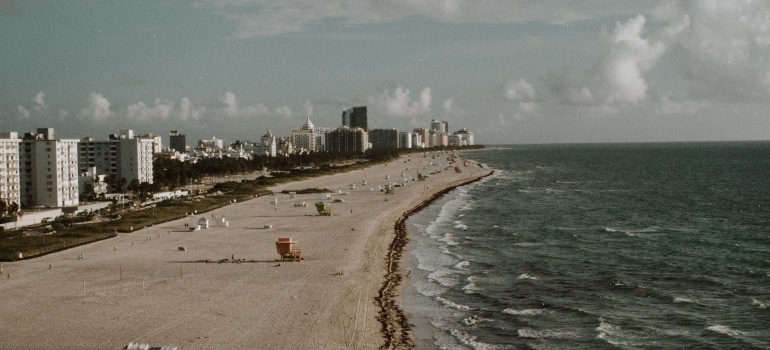 beach with buildings to live after you check Florida's real estate market