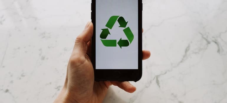 recycling sign on a cell phone